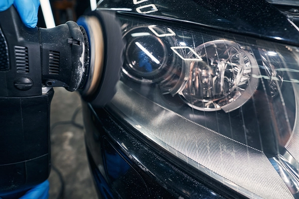 Polisher restoring headlight clarity